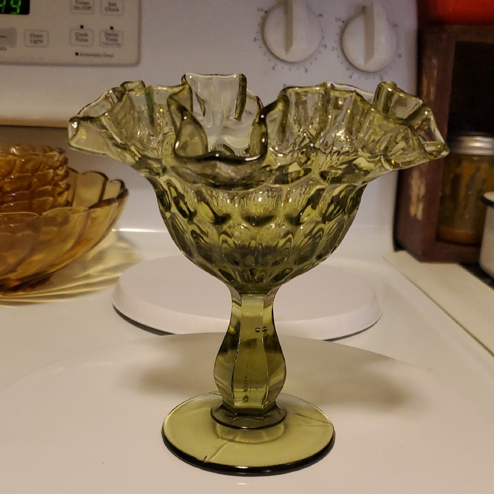 Vintage Fenton Green Glass Thumbprint Compote, also known as a candy dish